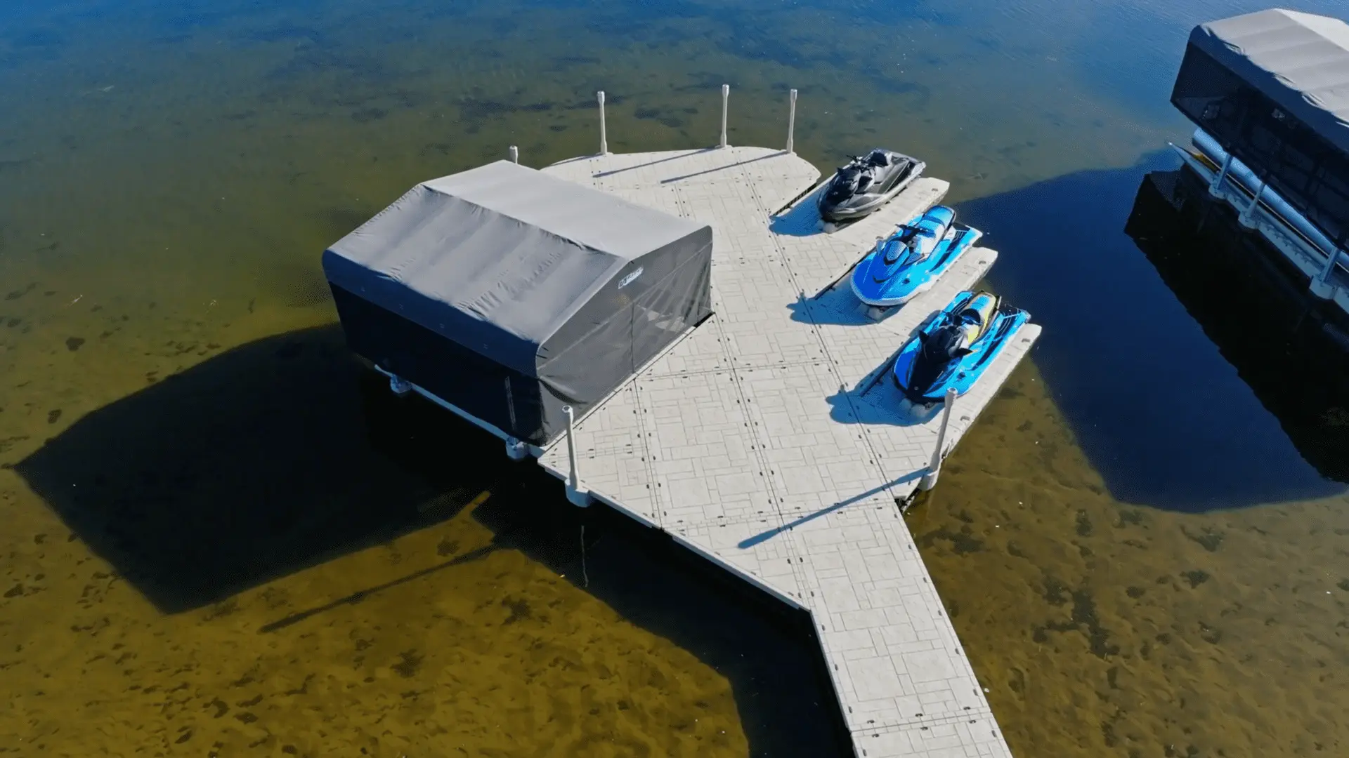 Boat docking on a Wave Armor Pro 220 port system at a waterfront property.