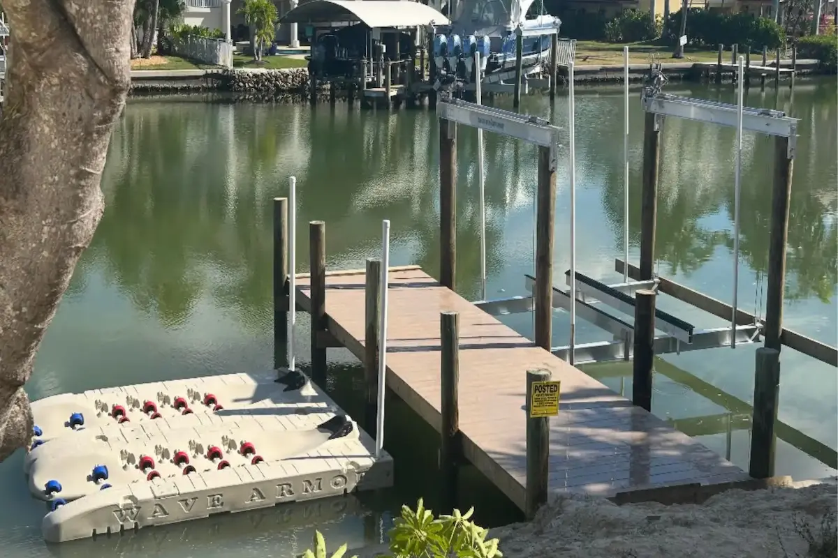 Wave Armor dock and aluminum boat lift installed on a Southwest Florida canal