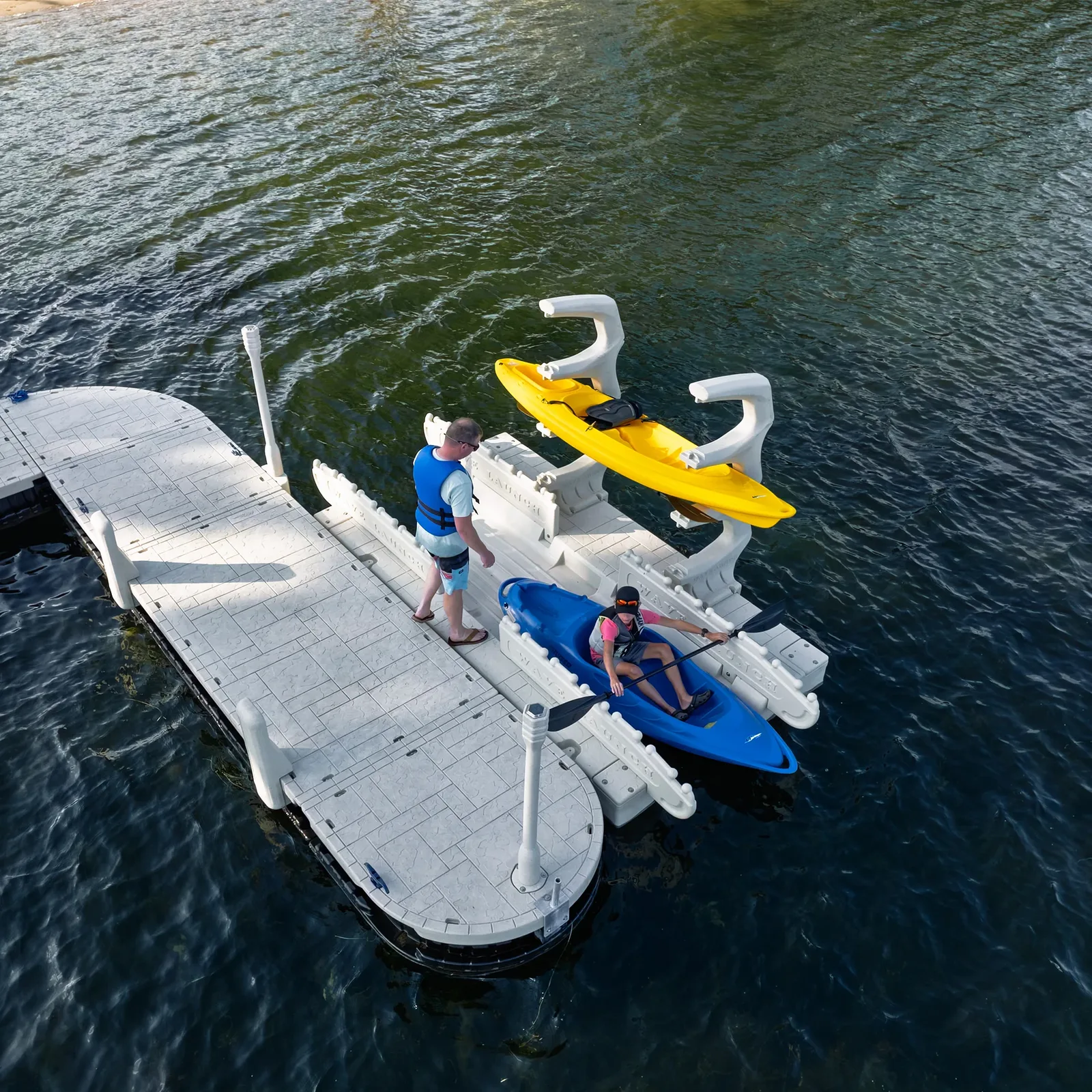 Aerial view of a Wave Armor Kayak Launch with 2 Rails mounted on a floating dock